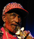 Lee Scratch Perry @ Band On The Wall, Manchester 19/2/2013, by Jake from Manchester, UK - CC BY 2.0, https://commons.wikimedia.org/w/index.php?curid=39926104